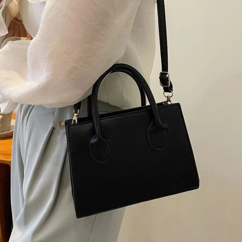 Dravina Tote — Gran capacidad para viajes y uso diario.