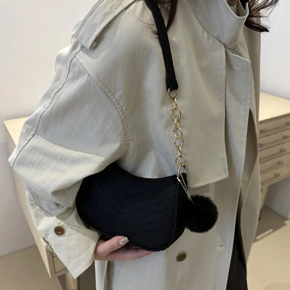 Nuvé Mini — Compacto y práctico para looks urbanos.