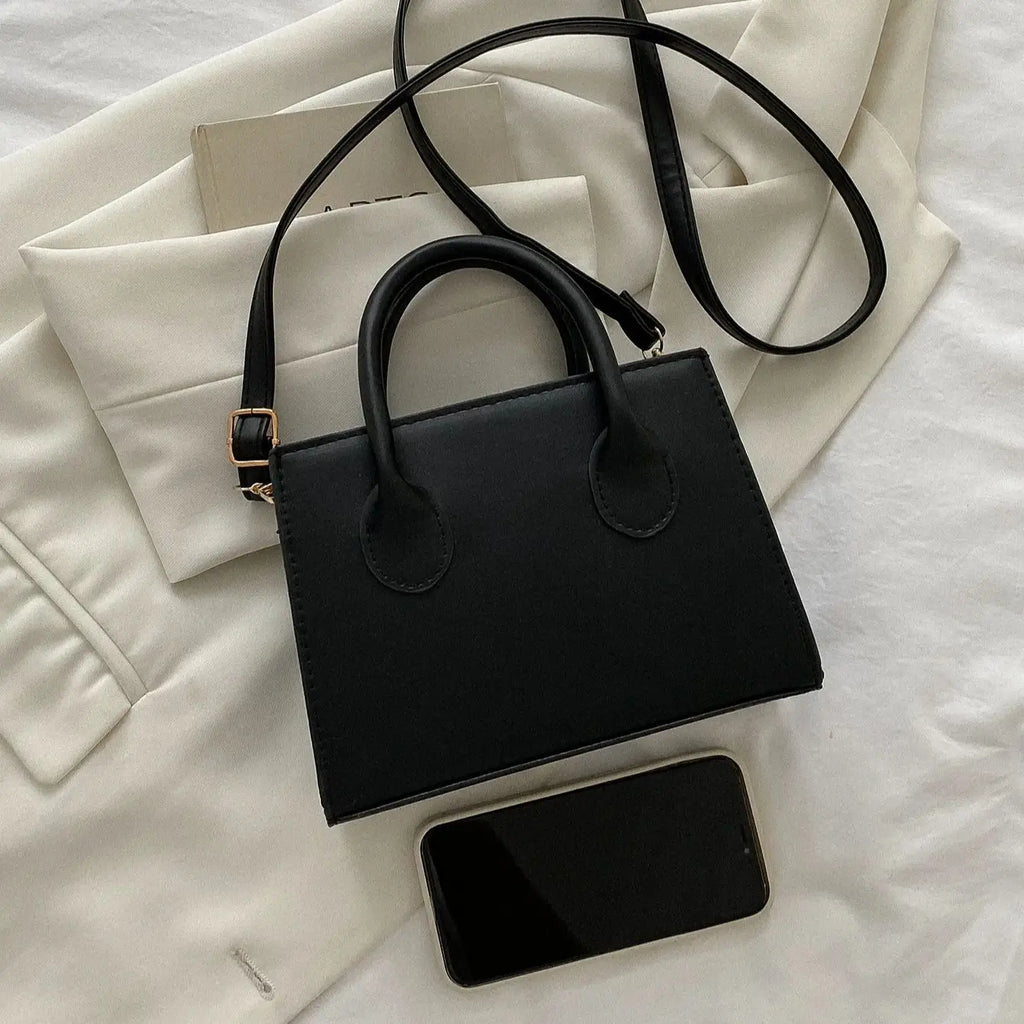 Dravina Tote — Gran capacidad para viajes y uso diario.