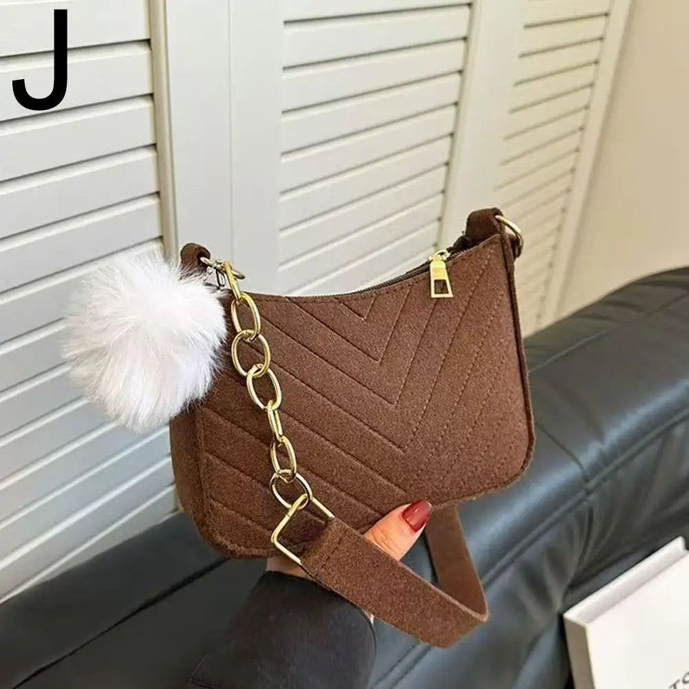 Nuvé Mini — Compacto y práctico para looks urbanos.