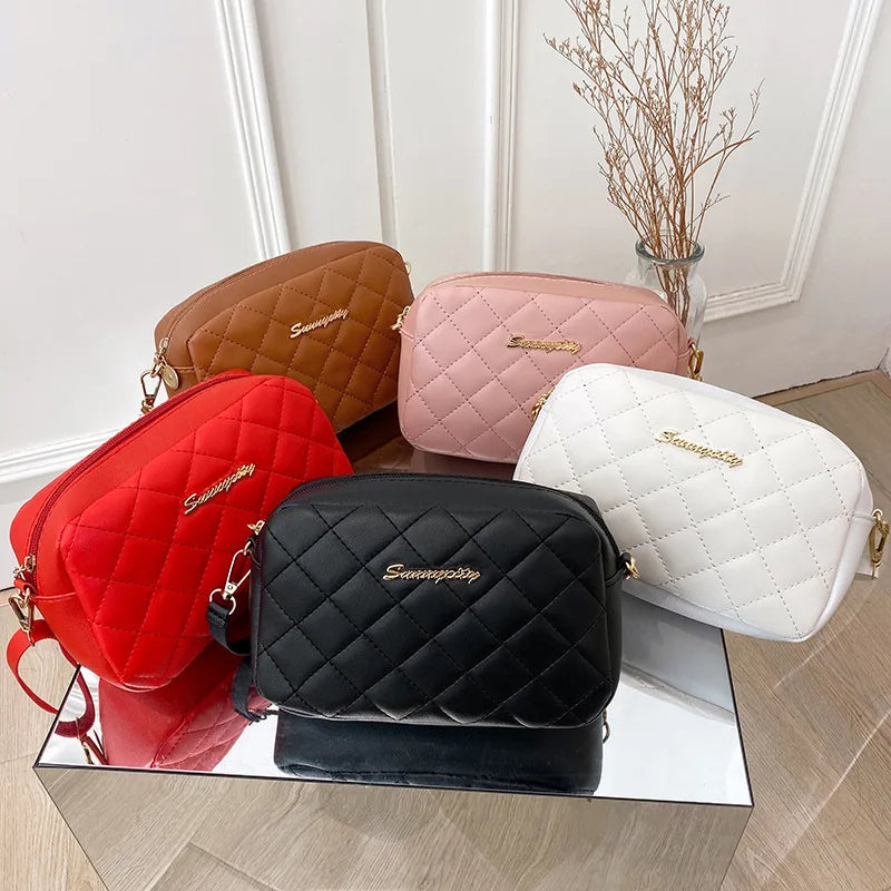 Norelle Cross — Diseño versátil para llevar al hombro o cruzado.