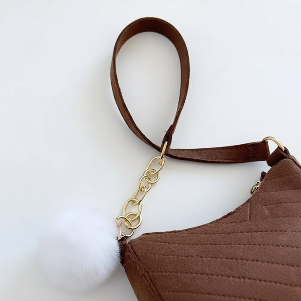 Nuvé Mini — Compacto y práctico para looks urbanos.