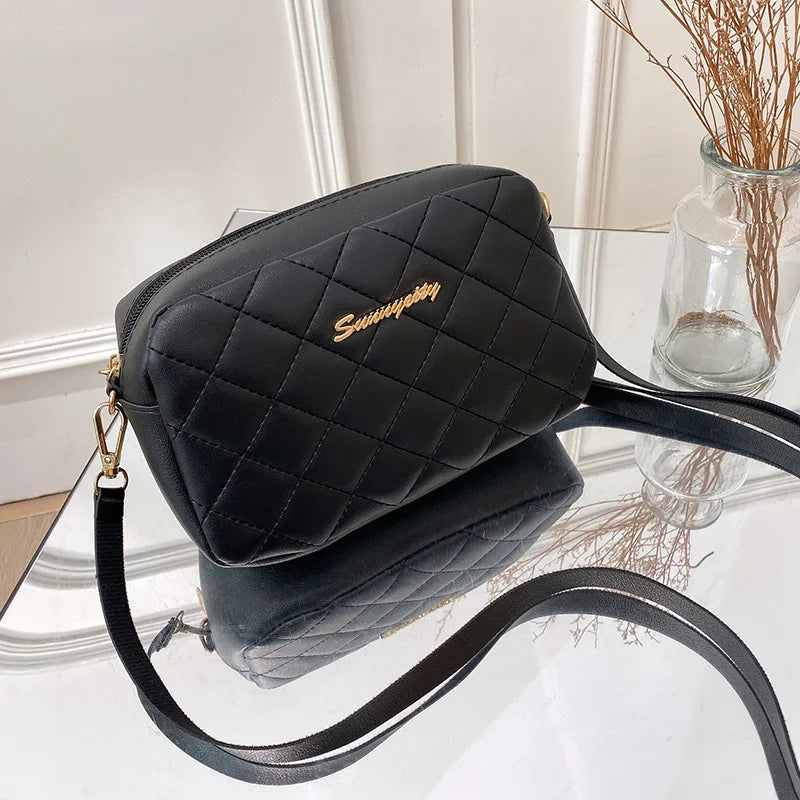 Norelle Cross — Diseño versátil para llevar al hombro o cruzado.