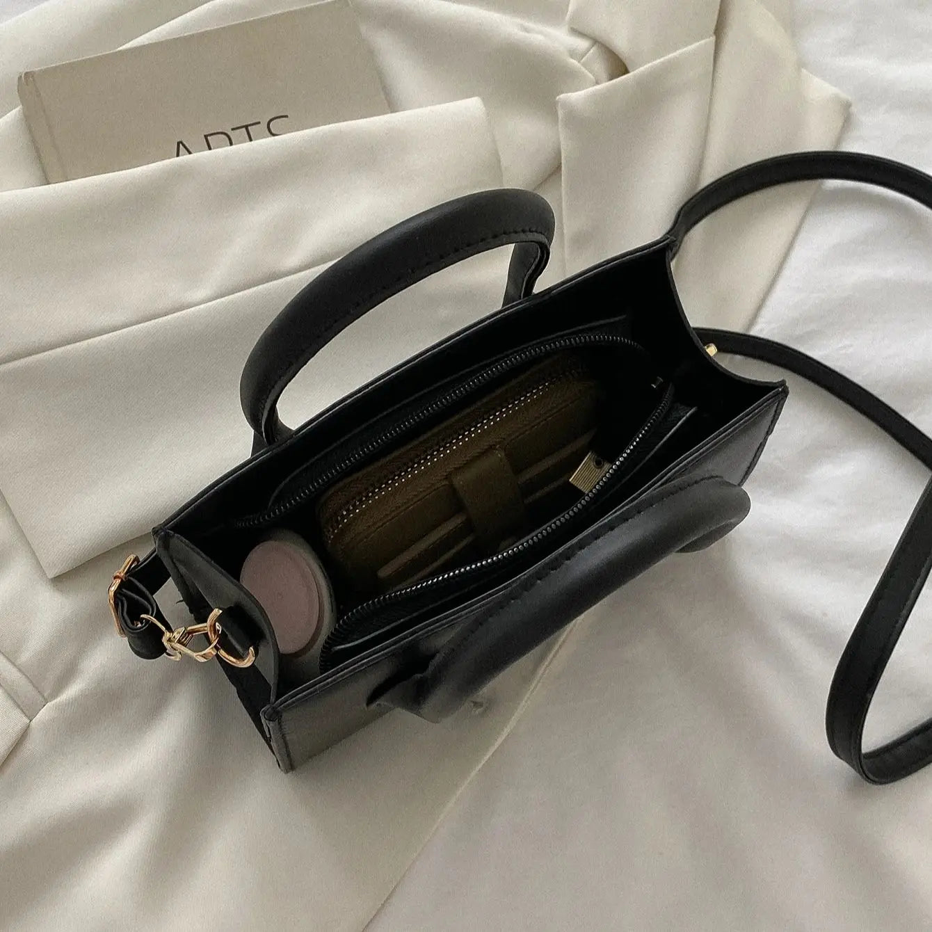Dravina Tote — Gran capacidad para viajes y uso diario.