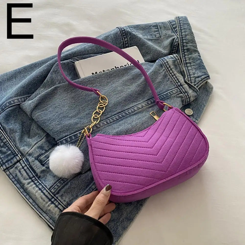 Nuvé Mini — Compacto y práctico para looks urbanos.
