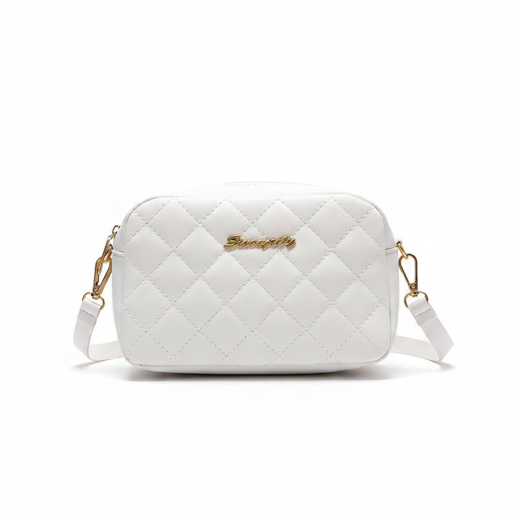 Norelle Cross — Diseño versátil para llevar al hombro o cruzado.