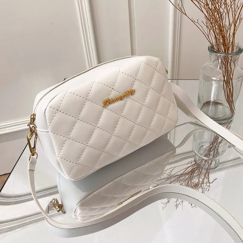 Norelle Cross — Diseño versátil para llevar al hombro o cruzado.